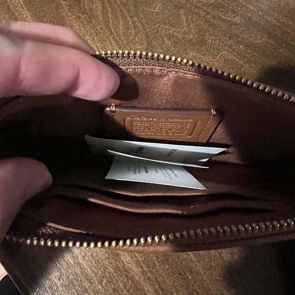 New with tags, never used, Coach Mickey Mouse Wristlet. - Picture 2 of 3